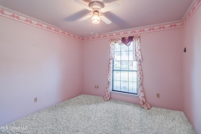 419 Cove Dr, Biloxi, MS 39531 - empty room featuring ceiling fan and carpet