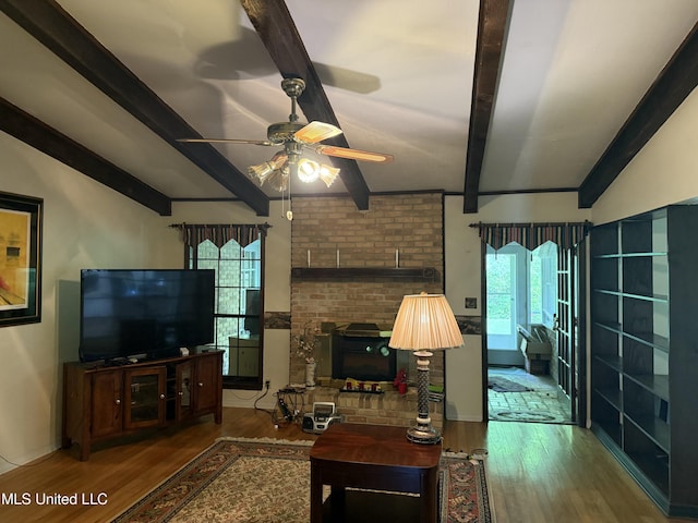 419 Cove Dr, Biloxi, MS 39531 - living area with a healthy amount of sunlight, ceiling fan, and wood finished floors