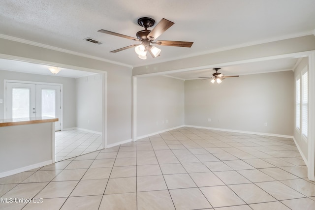 1302 Parktown Dr, Ocean Springs, MS 39564 - empty room featuring visible vents, crown molding, and ceiling fan