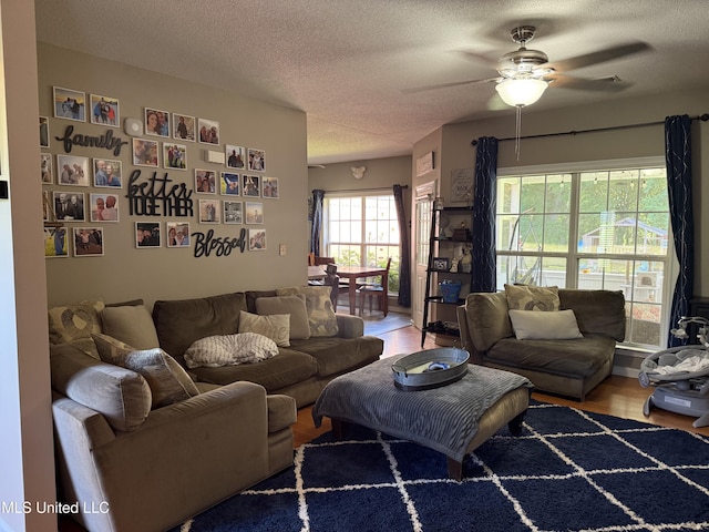 25 Dry Field Rd, Byhalia, MS 38611 - living area featuring a ceiling fan, a textured ceiling, and wood finished floors
