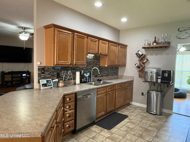 25 Dry Field Rd, Byhalia, MS 38611 - kitchen featuring dishwasher, backsplash, brown cabinets, a ceiling fan, and recessed lighting