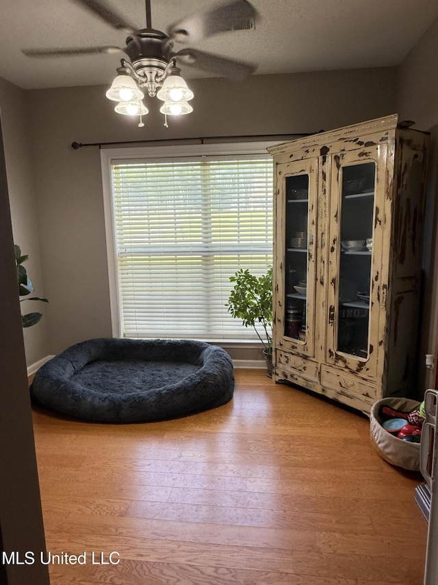 25 Dry Field Rd, Byhalia, MS 38611 - sitting room with ceiling fan, wood finished floors, and plenty of natural light