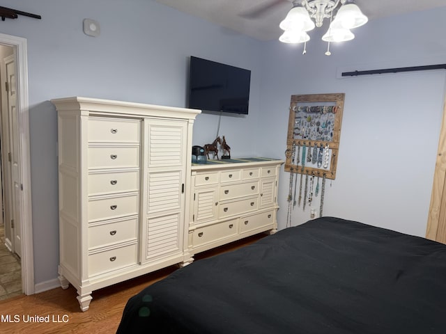 25 Dry Field Rd, Byhalia, MS 38611 - bedroom with dark wood-type flooring and ceiling fan