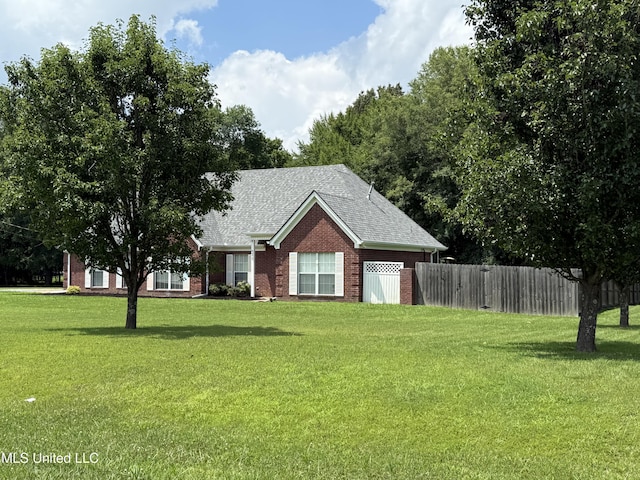 25 Dry Field Rd, Byhalia, MS 38611 - view of front of home with brick siding and roof with shingles