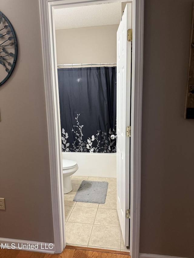 25 Dry Field Rd, Byhalia, MS 38611 - bathroom with toilet and tile patterned flooring