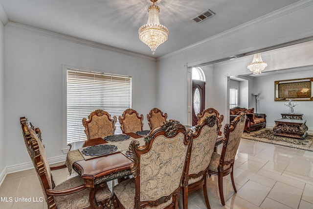 dining space with ornamental molding, light tile patterned flooring, visible vents, and an inviting chandelier