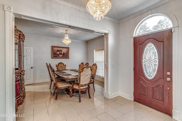 entryway with a chandelier, light tile patterned floors, baseboards, and crown molding