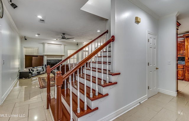 staircase with ceiling fan, recessed lighting, visible vents, baseboards, and crown molding