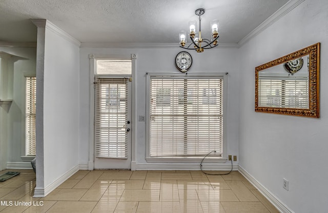 unfurnished dining area with a notable chandelier, light tile patterned floors, ornamental molding, a textured ceiling, and baseboards