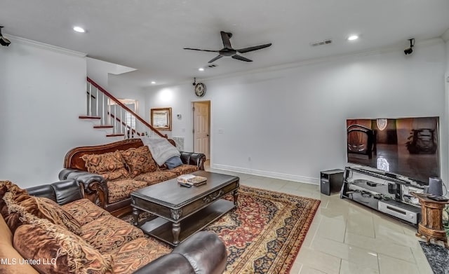 living area featuring ornamental molding, visible vents, and recessed lighting