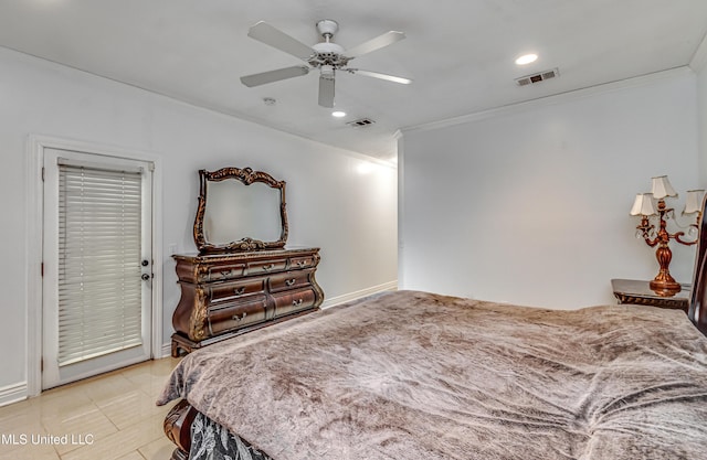 bedroom with light tile patterned flooring, visible vents, and crown molding