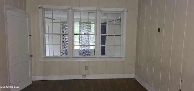 1080 Alta Vista Blvd, Jackson, MS 39209 - spare room with baseboards, dark wood-type flooring, and wooden walls