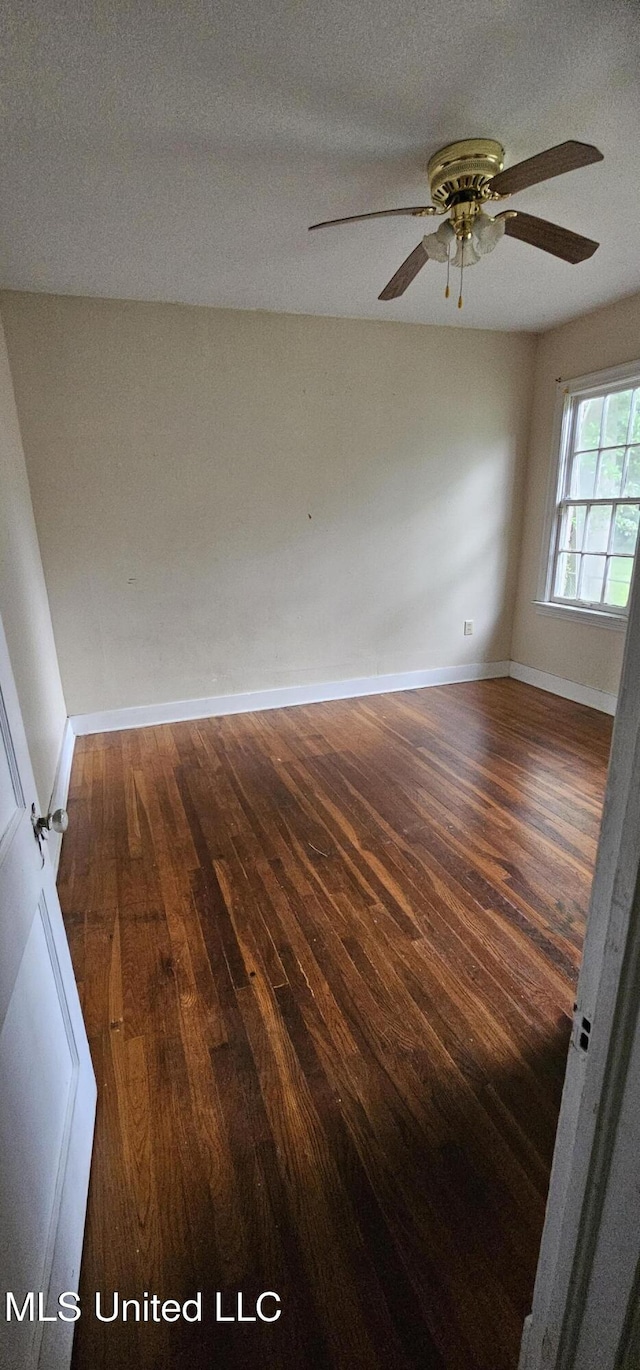 1080 Alta Vista Blvd, Jackson, MS 39209 - empty room featuring wood-type flooring, a ceiling fan, and baseboards