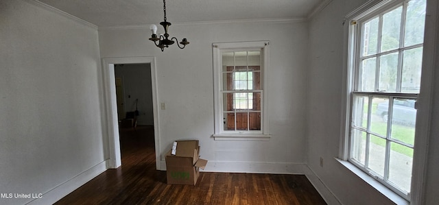 1080 Alta Vista Blvd, Jackson, MS 39209 - unfurnished dining area featuring healthy amount of natural light, a chandelier, dark wood-style flooring, and crown molding