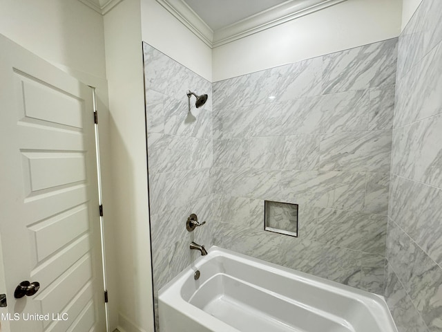 bathroom with tiled shower / bath and ornamental molding