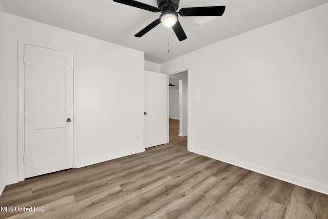 interior space with ceiling fan and light wood-type flooring