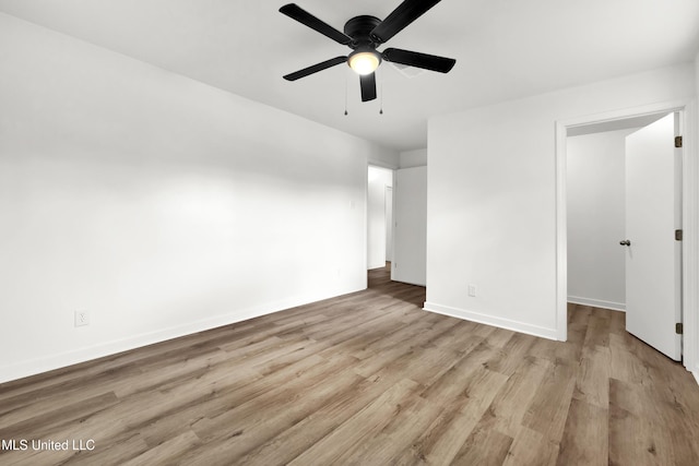 unfurnished bedroom with light wood-type flooring and ceiling fan