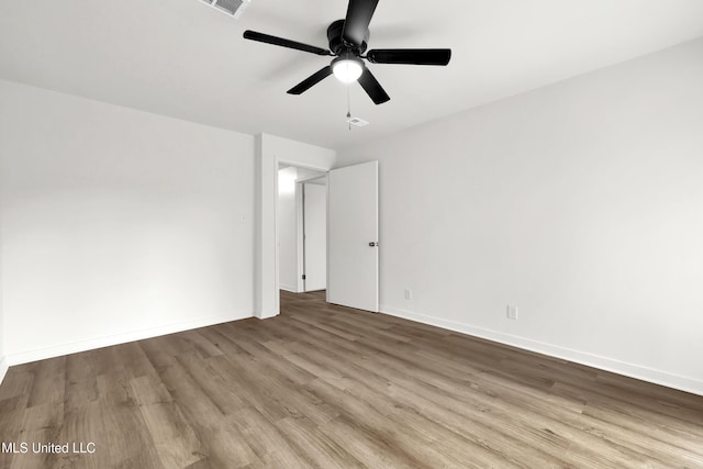 unfurnished room with ceiling fan and light hardwood / wood-style floors