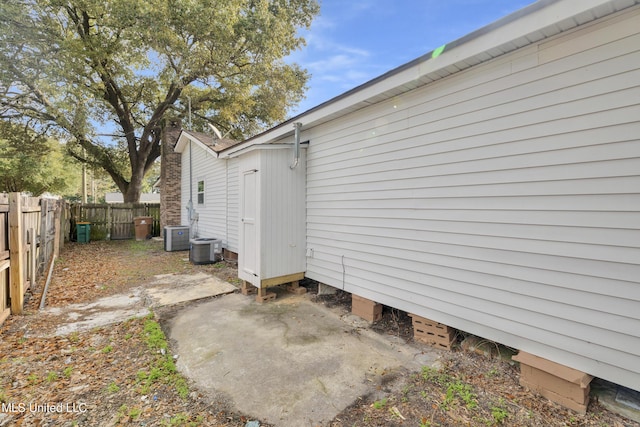 view of property exterior featuring central AC