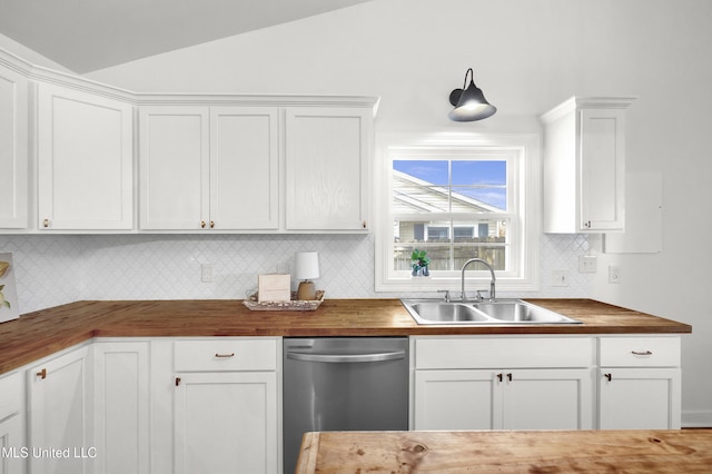 kitchen with sink, white cabinets, butcher block countertops, and dishwasher