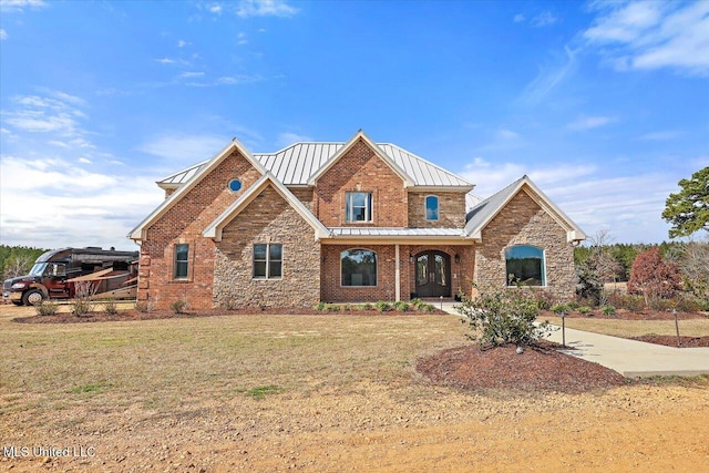 view of front of house featuring a front lawn, a carport, and covered porch