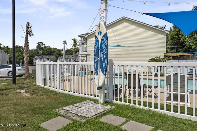 view of side of property featuring a yard