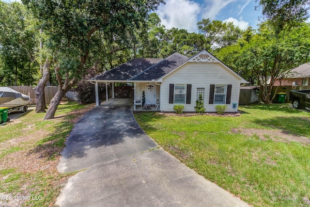 7505 Martin Ct, Ocean Springs, MS 39564 - view of front facade featuring concrete driveway and an attached carport