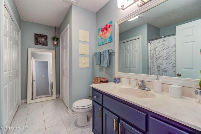 7505 Martin Ct, Ocean Springs, MS 39564 - full bath with vanity, toilet, a textured ceiling, marble finish floors, and baseboards