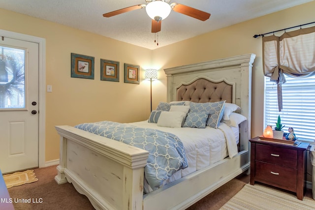 7505 Martin Ct, Ocean Springs, MS 39564 - carpeted bedroom with a ceiling fan and baseboards