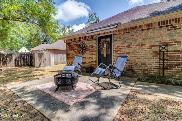7505 Martin Ct, Ocean Springs, MS 39564 - view of patio featuring a fire pit