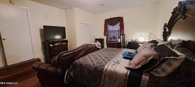 bedroom featuring hardwood / wood-style flooring