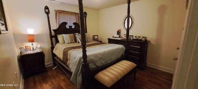 bedroom featuring dark hardwood / wood-style floors