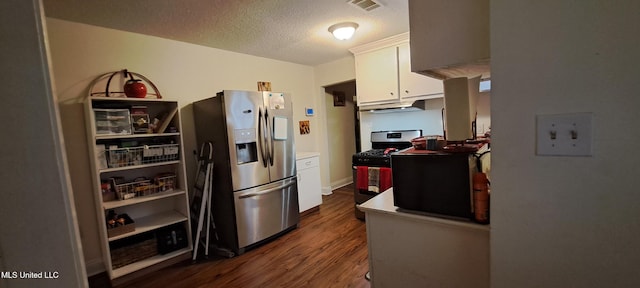 kitchen featuring stainless steel fridge, white cabinets, dark hardwood / wood-style flooring, a textured ceiling, and black range