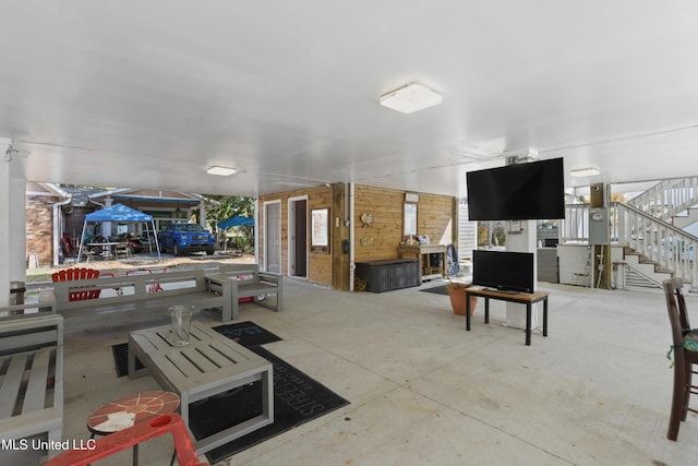 interior space featuring stairway and concrete floors