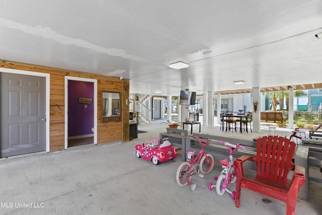 garage with wood walls