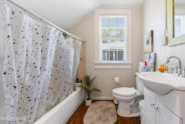 full bath with shower / bathtub combination with curtain, toilet, wood finished floors, lofted ceiling, and vanity