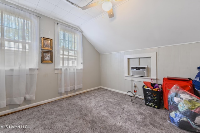 additional living space with ceiling fan, cooling unit, lofted ceiling, and carpet