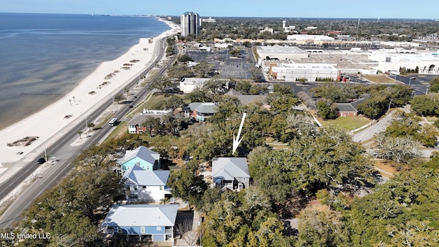 bird's eye view featuring a beach view and a water view