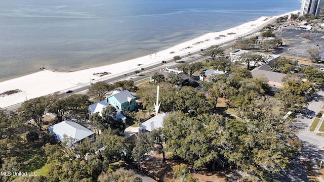 bird's eye view featuring a beach view and a water view