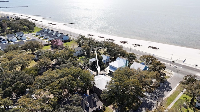 drone / aerial view featuring a residential view and a water view