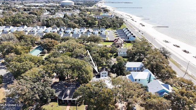 drone / aerial view with a residential view and a water view