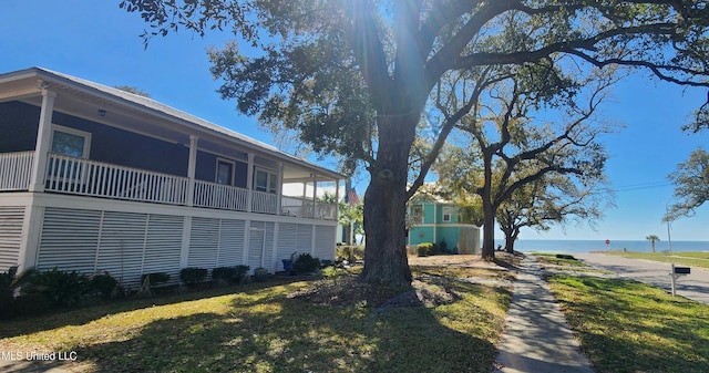 exterior space featuring a water view