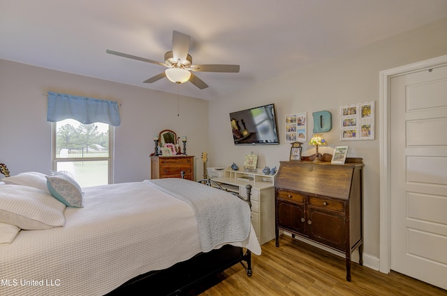 598 Westfield Dr, Pearl, MS 39208 - bedroom featuring wood finished floors and a ceiling fan