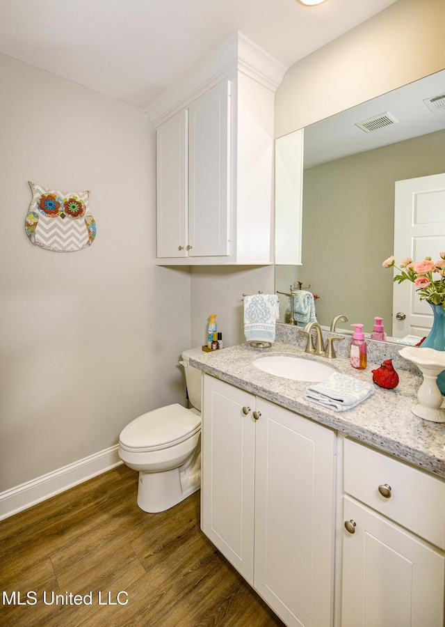 598 Westfield Dr, Pearl, MS 39208 - half bathroom with wood finished floors and vanity