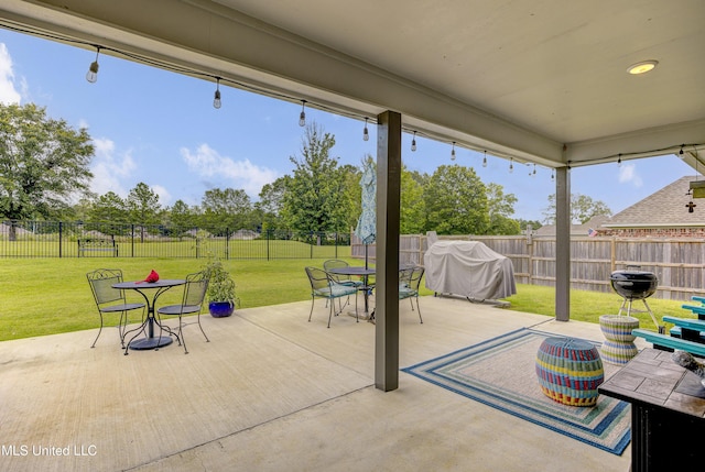 598 Westfield Dr, Pearl, MS 39208 - fenced backyard featuring outdoor dining space and a patio area