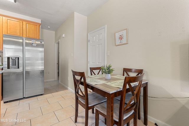 view of tiled dining room