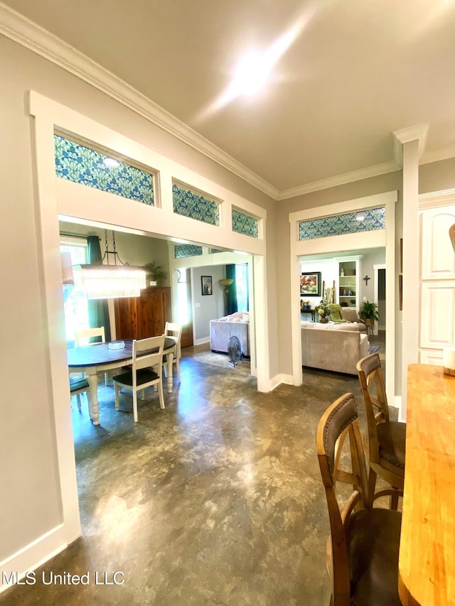 115 Pinedale Rd, Terry, MS 39170 - dining room featuring crown molding and concrete flooring