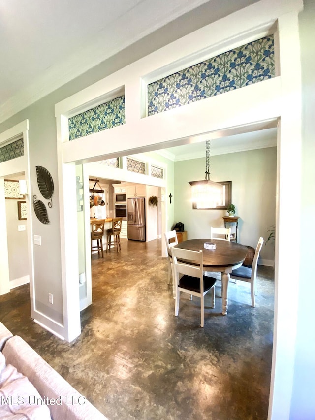 115 Pinedale Rd, Terry, MS 39170 - dining space with crown molding and concrete flooring