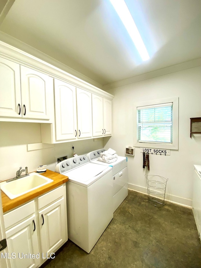 115 Pinedale Rd, Terry, MS 39170 - laundry area featuring cabinet space and washer and clothes dryer