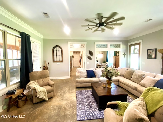 115 Pinedale Rd, Terry, MS 39170 - living room with a ceiling fan, plenty of natural light, concrete flooring, ornamental molding, and baseboards